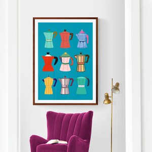 May include: A framed print of nine colorful Moka pots on a turquoise background. The print is hanging on a white wall above a magenta armchair.