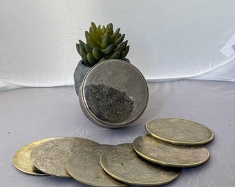 Juego de posavasos vintage de latón plateado
