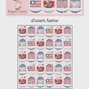 May include: A fabric panel featuring a quilt pattern with house-shaped blocks in red, blue, and floral prints. The words "dream home" are displayed in a script font. The panel is from Poppie Cotton.