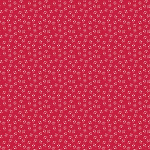 May include: A vibrant red fabric featuring a repeating pattern of tiny white flowers with small green leaves. The floral print is evenly distributed across the surface, creating a consistent and dense botanical design throughout the entire material.