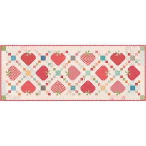 May include: A rectangular quilt featuring a repeating pattern of strawberries in various shades of red and pink. The strawberries are interspersed with small, colorful square blocks and green leaves. The quilt has a scalloped border.