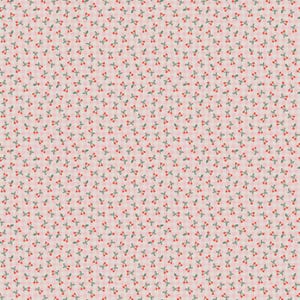 May include: A repeating pattern of small red cherries with green stems and leaves scattered across a light pink background. The fabric has a subtle, textured appearance, creating a delicate and charming design.