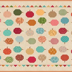 May include: A rectangular quilt featuring a repeating pattern of small, multi-colored fabric pumpkins in various prints and hues, including red, orange, green, blue, and tan, set against a cream background with a decorative triangular border.