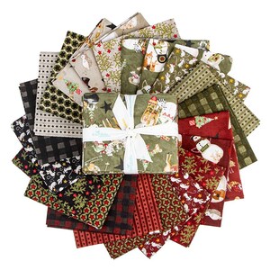 May include: A fabric bundle featuring a variety of folded cotton squares arranged in a circular fan pattern. The textiles display holiday-themed prints including snowmen, reindeer, stars, plaid, and stripes in shades of red, green, black, and cream.
