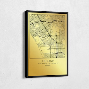 May include: A gold-colored map of Chicago, Illinois with black lines outlining the streets and neighborhoods. The city name and coordinates are printed in black at the bottom of the map.