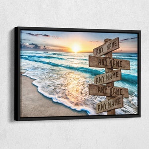 May include: A beach scene with a sunset over the ocean. Five wooden signs with the text "ANY NAME" are stacked on a post in the sand.