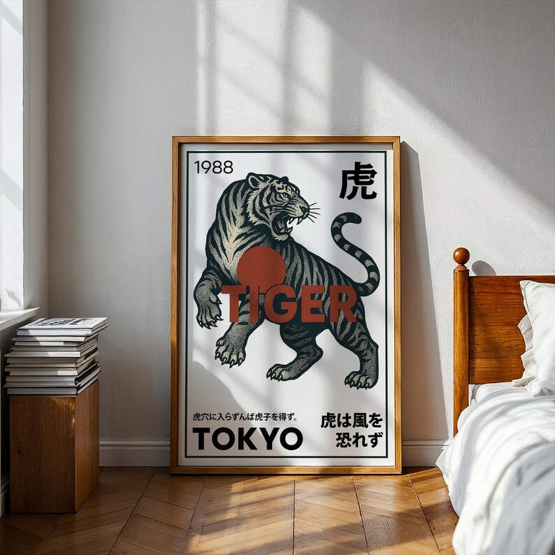 May include: A framed poster featuring a stylized illustration of a tiger. The tiger is black and gray with a red circle behind the word "TIGER". The poster includes the year "1988" and Japanese text, with "TOKYO" at the bottom.