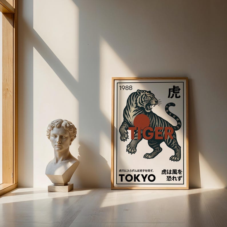 May include: A framed poster with a tiger illustration in black, gray, and red. The word "TIGER" is prominently displayed, along with Japanese text and the year "1988". A classical bust is to the left.