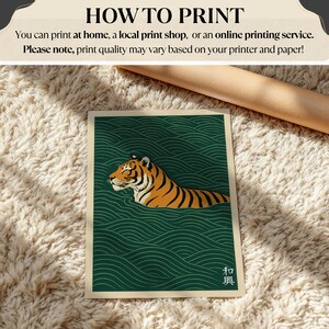 May include: A print featuring a tiger swimming in green water with a wave pattern. The tiger is orange and black. The print has Japanese text in the lower right corner. The text at the top says "HOW TO PRINT".
