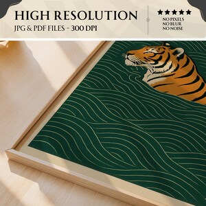 May include: A framed art print featuring a tiger illustration. The artwork has a green background with gold wave-like lines. The tiger is orange and black. The frame is light wood. Text at the top reads "HIGH RESOLUTION" and "JPG & PDF FILES - 300 DPI".