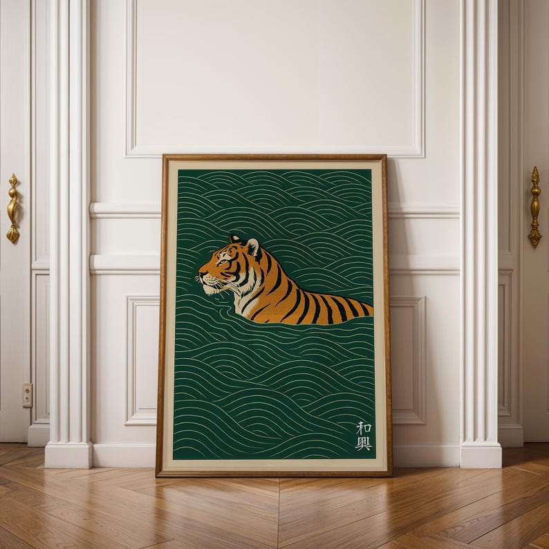 May include: Framed art print featuring a tiger swimming in water. The tiger has orange and black stripes, set against a dark green background with a wave pattern. The print includes Japanese text in the lower right corner.