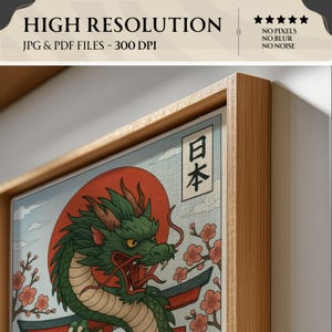May include: A framed print featuring a green dragon with a red sun in the background, Japanese text, and cherry blossoms. The frame is made of light-colored wood. The text at the top says "HIGH RESOLUTION" and "JPG & PDF FILES - 300 DPI".