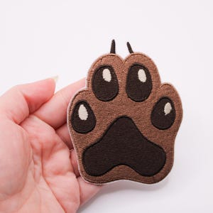 Parche termoadhesivo bordado con forma de pata de perro: un regalo para el recuerdo de tu mascota