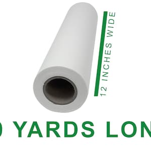 May include: A white roll of paper, 12 inches wide and 10 yards long.