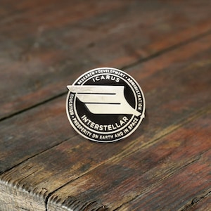 Icarus Interstellar &quot;Iron Wing&quot; Lapel Pin