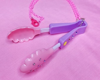 Pink salad tongs chunky bling maximalist necklace