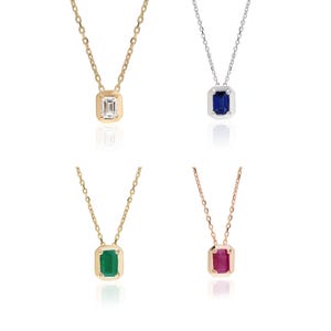 Natuurlijke robijn, saffier, smaragd, 14 kt gouden smaragd geslepen