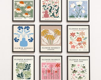 May include: Nine framed prints with floral designs and the text "Flower Market" and the city name. The prints are in a variety of colors, including pink, blue, green, yellow, and red.