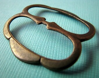 Cool steel buckle/slide in brass ox
