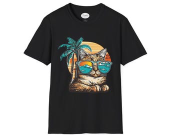 May include: Black t-shirt featuring a graphic of a cat wearing sunglasses and a palm tree in the background. The cat is looking at the viewer. The graphic is in a retro style.