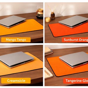 Peut inclure: Quatre images présentant un ordinateur portable sur des tapis de souris rectangulaires colorés. Les tapis sont en Mango Tango, Orange Soleil, Crème glacée et Tangerine Glow. Chaque tapis a une bordure noire. Les images sont sur un bureau en bois.