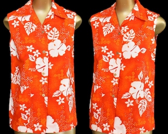 Blusa vintage de los años 60 estilo hawaiano, de tela de corteza, con estampado floral tropical naranja y blanco, sin mangas, botones estilo metálico, talla M.