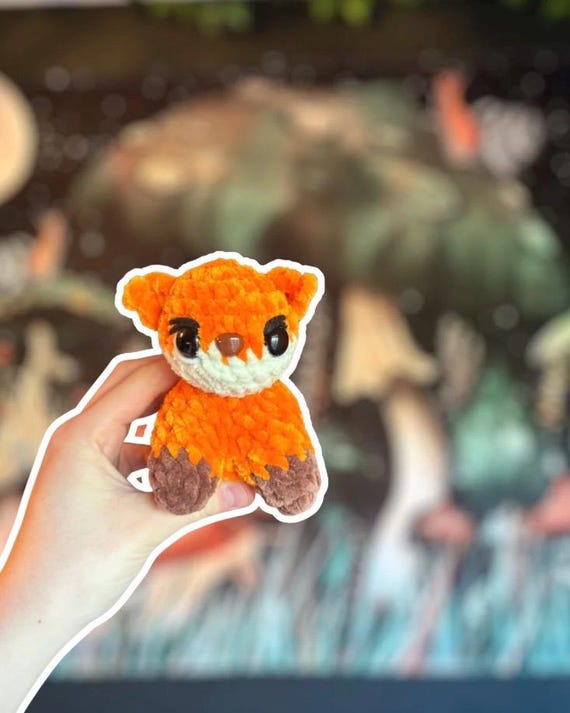 ハンドメイド ぬいぐるみ キツネ 手作りかぎ針編みのキツネのぬいぐるみ - オレンジとブラウンの編み