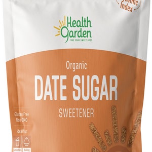 May include: A brown bag of Health Garden Organic Date Sugar Sweetener. The bag is labeled with the product name, ingredients, and a low glycemic index logo. The bag is 1 pound (16 ounces or 453 grams).