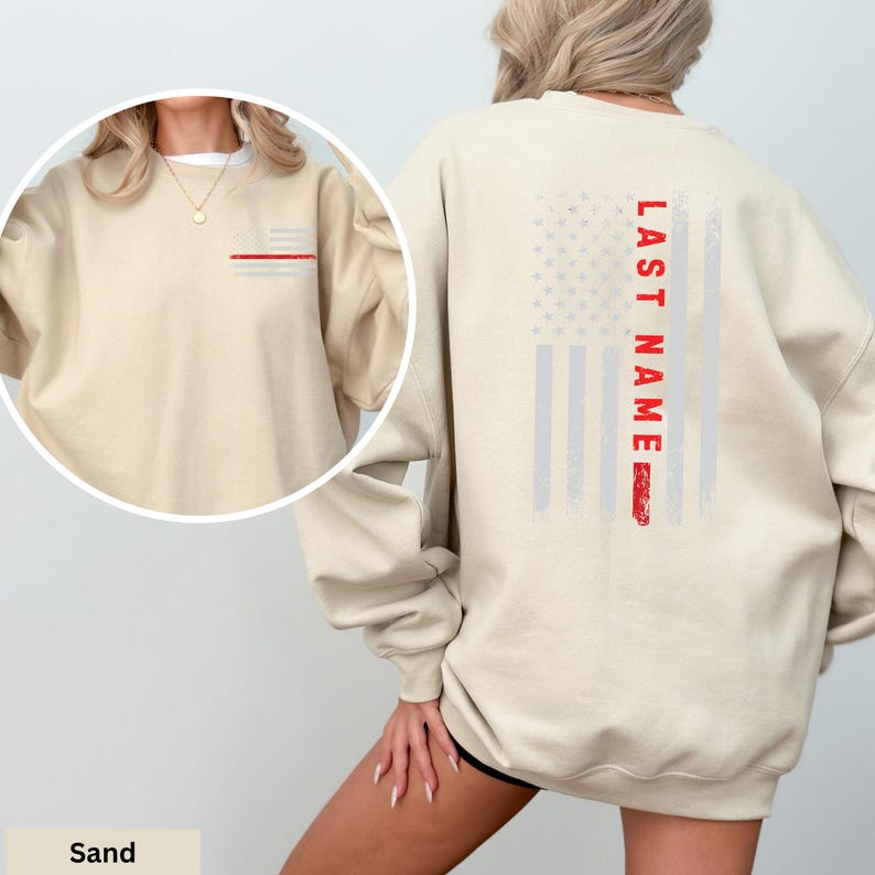 a woman wearing an american flag sweatshirt and shorts