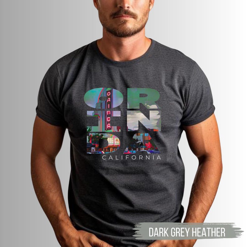 Dark Grey Heather shirt featuring Orinda California text with the iconic Orinda Theatre design integrated into the letters. Simple and stylish, this tee is perfect for showcasing local pride and celebrating Orinda and Lamorinda's charm