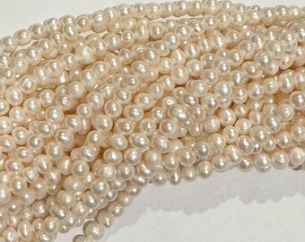 one strand 14 inch  fresh water potato pearls 5-6mm