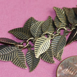 one foot  Antique brass chain with leaves 6x14mm