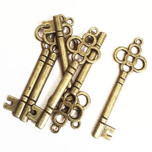 12 Antiqued Brass Key Pendants: Bronze Charms (46x15mm)