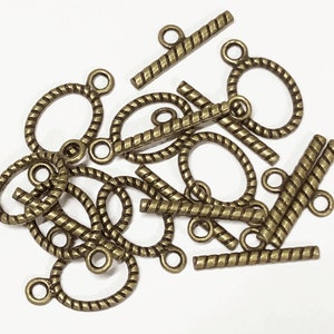 50 Sets Antiqued Brass Twisted Oval Toggle Clasps: Jewelry Findings