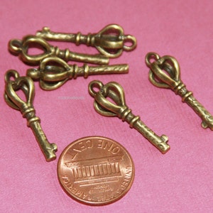 Bulk 30 pcs Antiqued brass finished key charm 26x9mm image 2