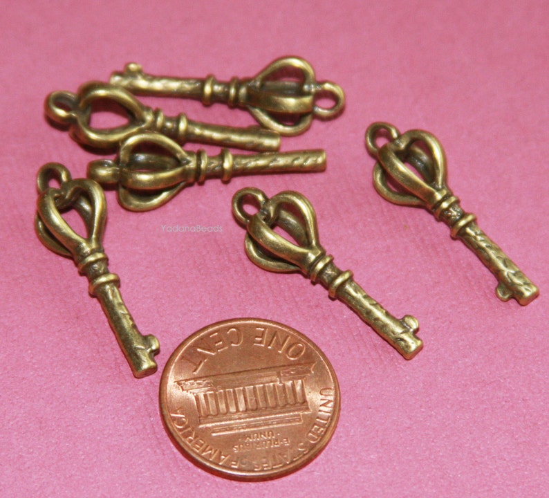 Bulk 30 pcs Antiqued brass finished key charm 26x9mm image 2