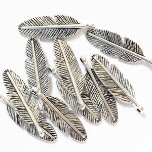 140 Antique Silver Feather Charms: Alloy Pendants (30x9mm)