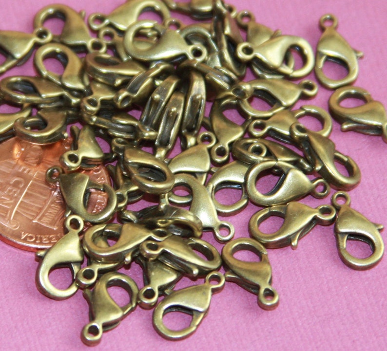 50 pcs antique brass lobster claw clasp 12X7mm , alloy lobster clasps image 1