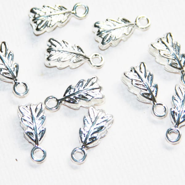 10 pcs of  Silver plated pewter leaf bail 7x14mm