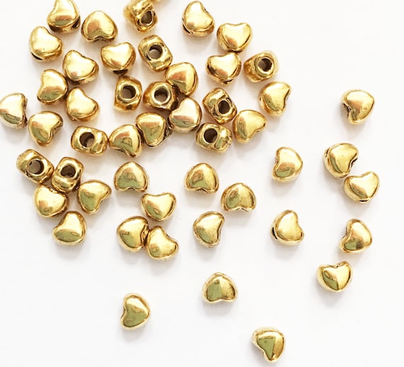 Buy 100 Antique Gold Heart Spacer Beads: Zinc Alloy (3x3mm) Online