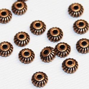 50 pcs  antique copper twisted rondelle spacer 6x3.5mm