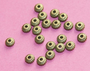 50 pcs  antique brass twisted rondelle spacer 6x3.5mm