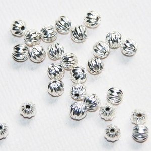 100 Silver Plated Corrugated Round Beads: 4mm Brass Spacer Beads