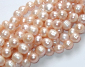 15 inch strand  cultured freshwater potato pearls 6-7mm peach