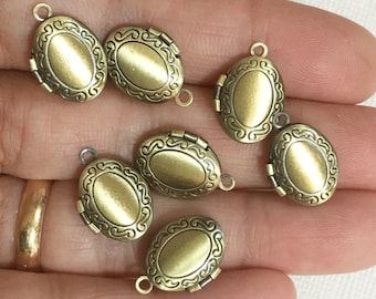 10 colgantes ovalados de latón antiguo: marco de fotos pequeño (11 x 16 mm)