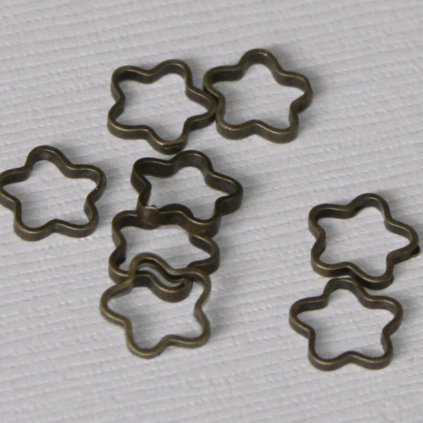 100pcs  antiqued brass flower rings 8mm