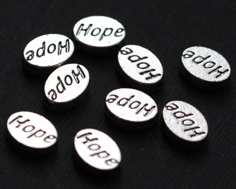 10 pcs antiqued silver flat oval beads with 'HOPE' 8x11mm image 1