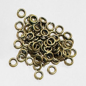 200 piezas de anilla de latón envejecido de 5 mm de diámetro, calibre 18