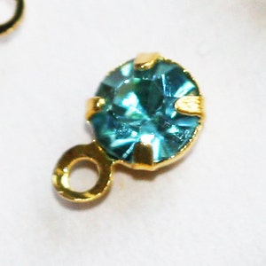 20 Aqua color Rhinestone with gold color brass setting 5x7.5mm