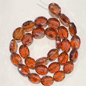 Electroplated Oval Crystal Beads: 12x15mm Jonquil Brown Strand